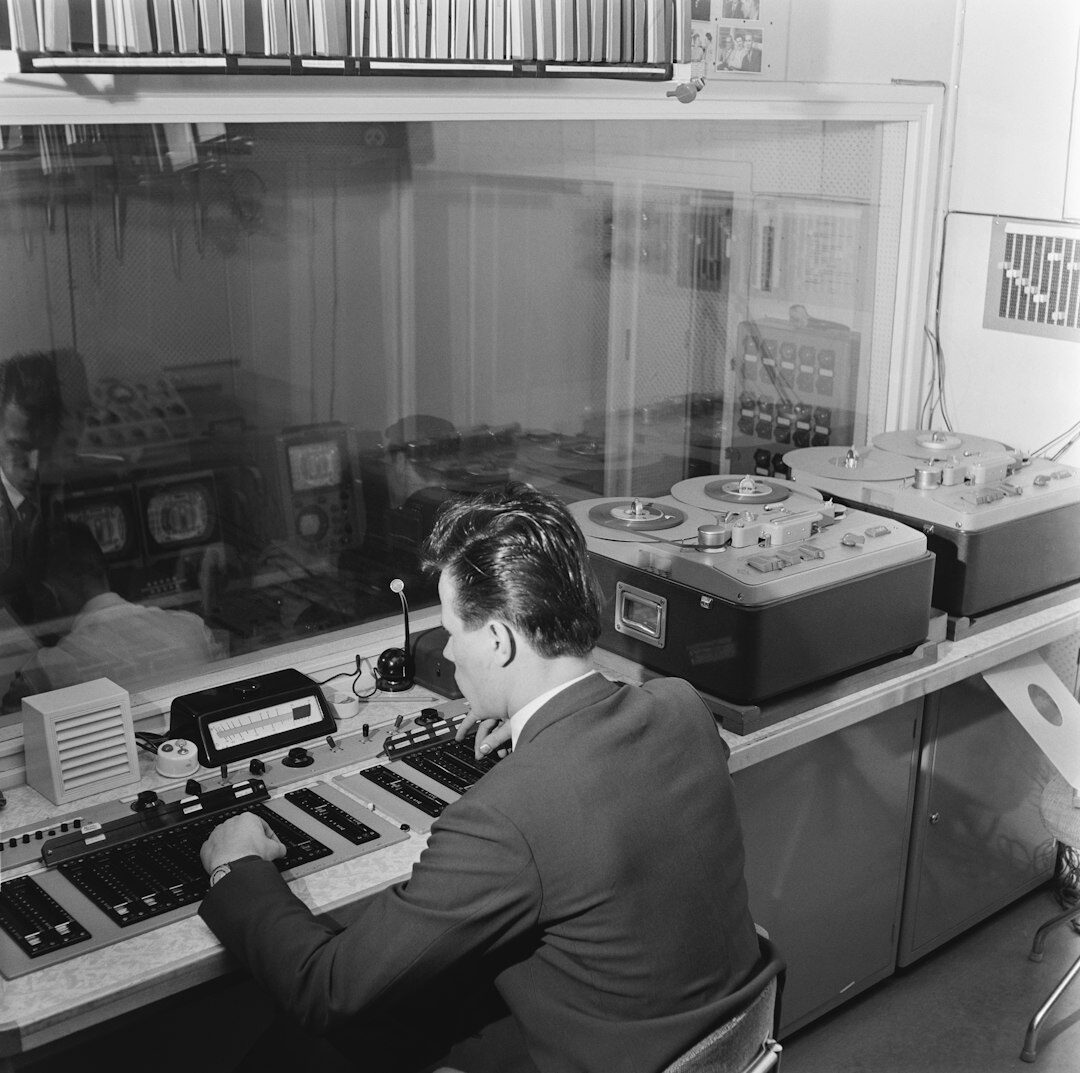 Broadcast coordinator working at a live television control room desk